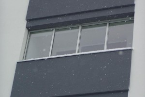 zasklenie balkóna v bytovom dome